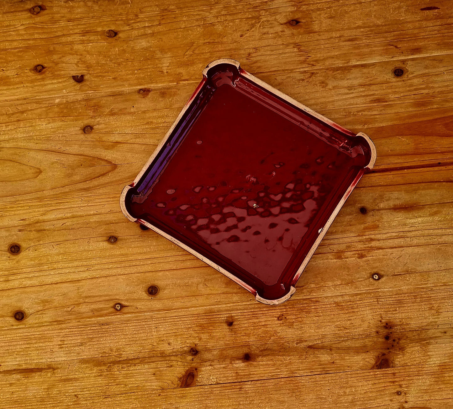 Dessous de plat en céramique rouge vintage les kitscheries brocante en ligne