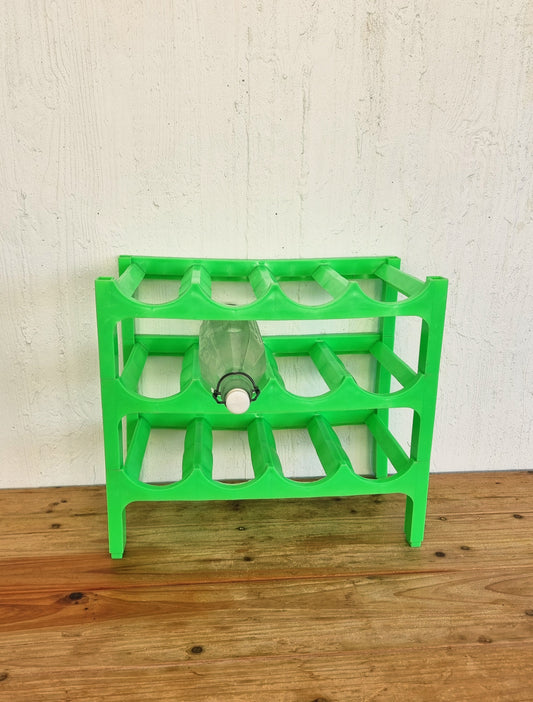 Casier à bouteilles vintage vert en plastique space age années 70