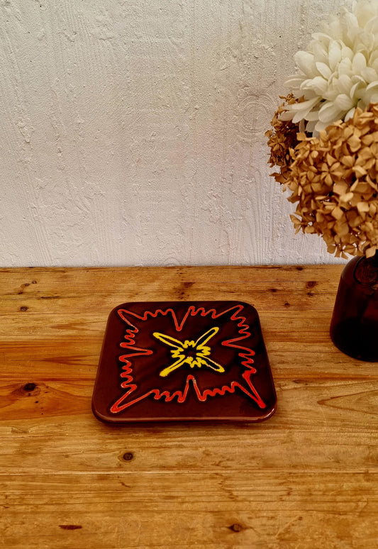 Dessous de plat vintage en céramique motif géométrique années 70