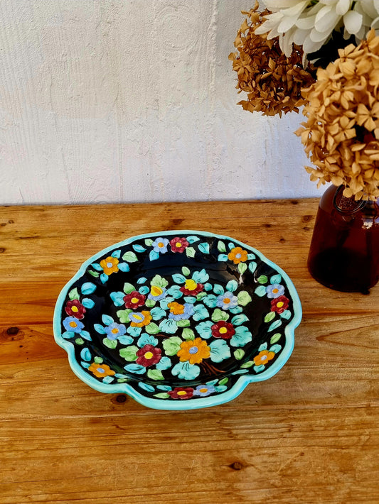 Grande coupe à fruits vintage Cerart Monaco en céramique noire à décor floral coloré