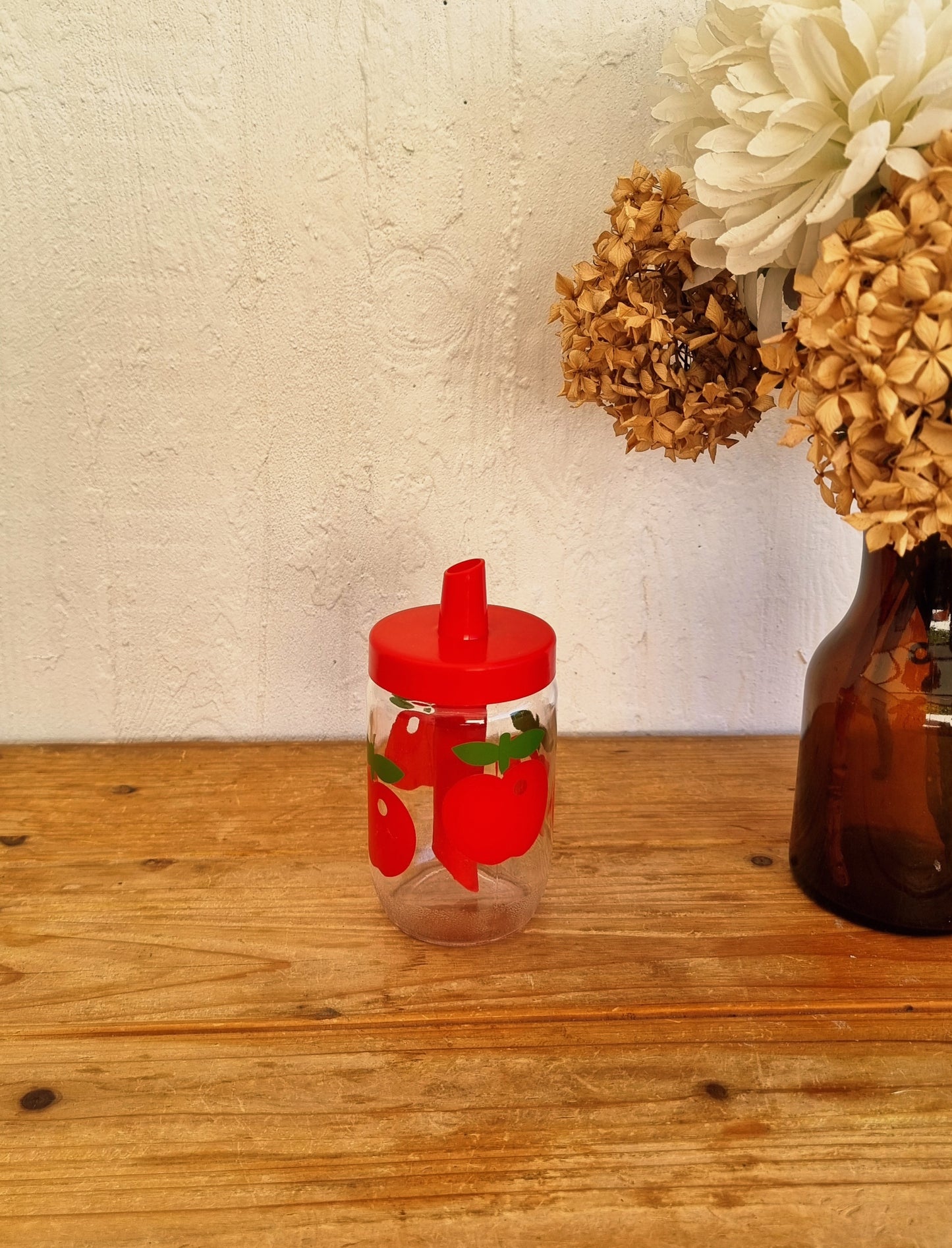 Pot à sucre verseur Henkel vintage en verre décor pommes rouges années 70
