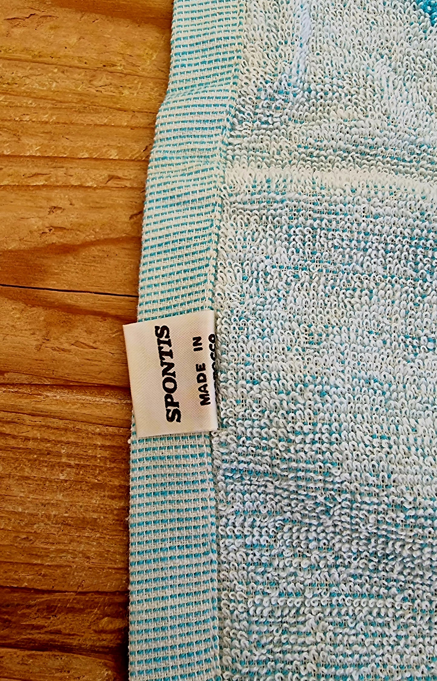 Serviette de toilette vintage Spontis turquoise à motif floral blanc