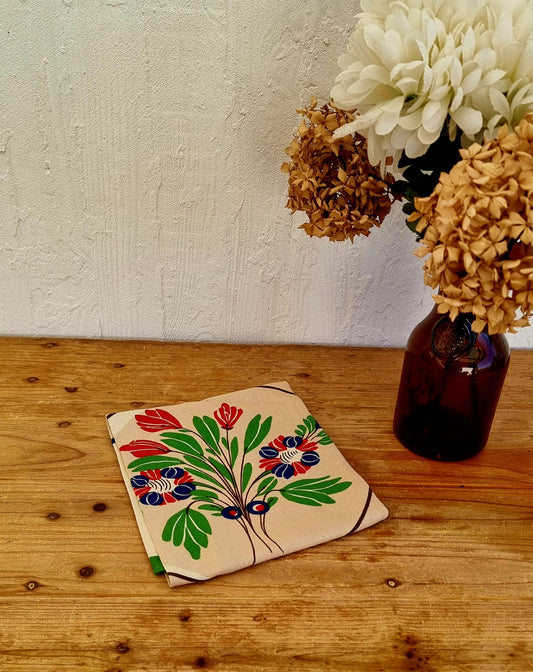 Torchon vintage neuf en coton et lin avec motif floral rouge vert et bleu et bordure verte