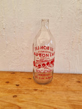 Charger l&#39;image dans la galerie, Ancienne bouteille &quot;Au bon lait&quot; verre les kitscheries brocante en ligne
