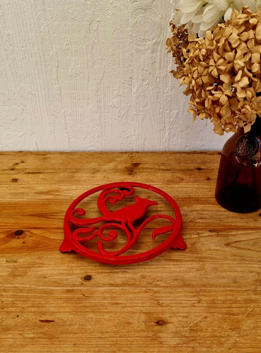 Dessous de plat en fonte oiseau rouge les kitscheries brocante en ligne