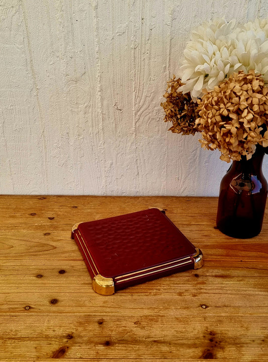Dessous de plat en céramique rouge vintage les kitscheries brocante en ligne