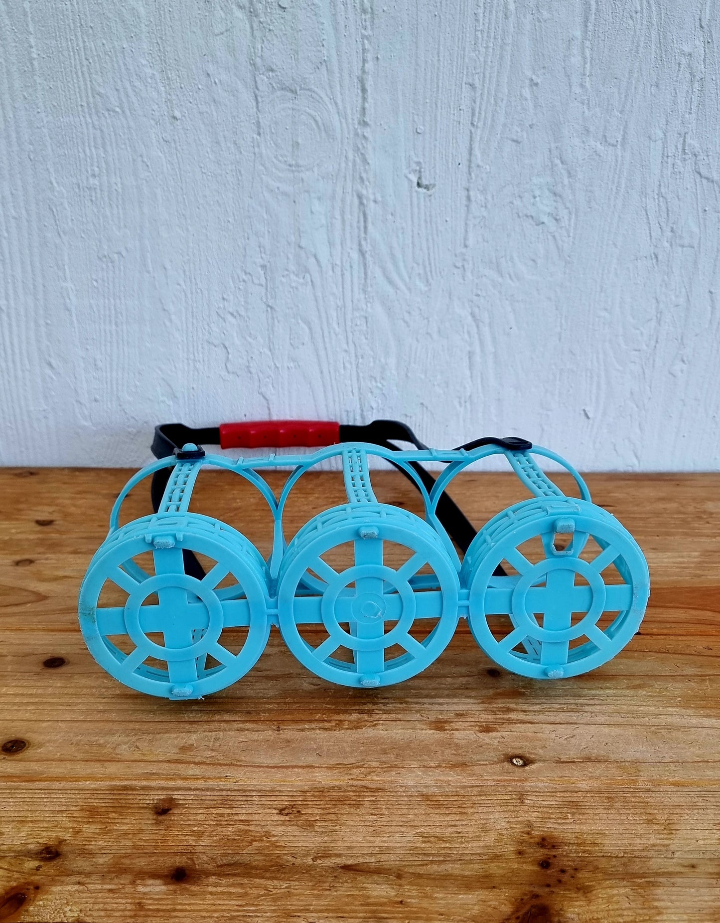 porte-bouteilles bleu turquoise vintage plastique années 70 capacité 3 bouteilles