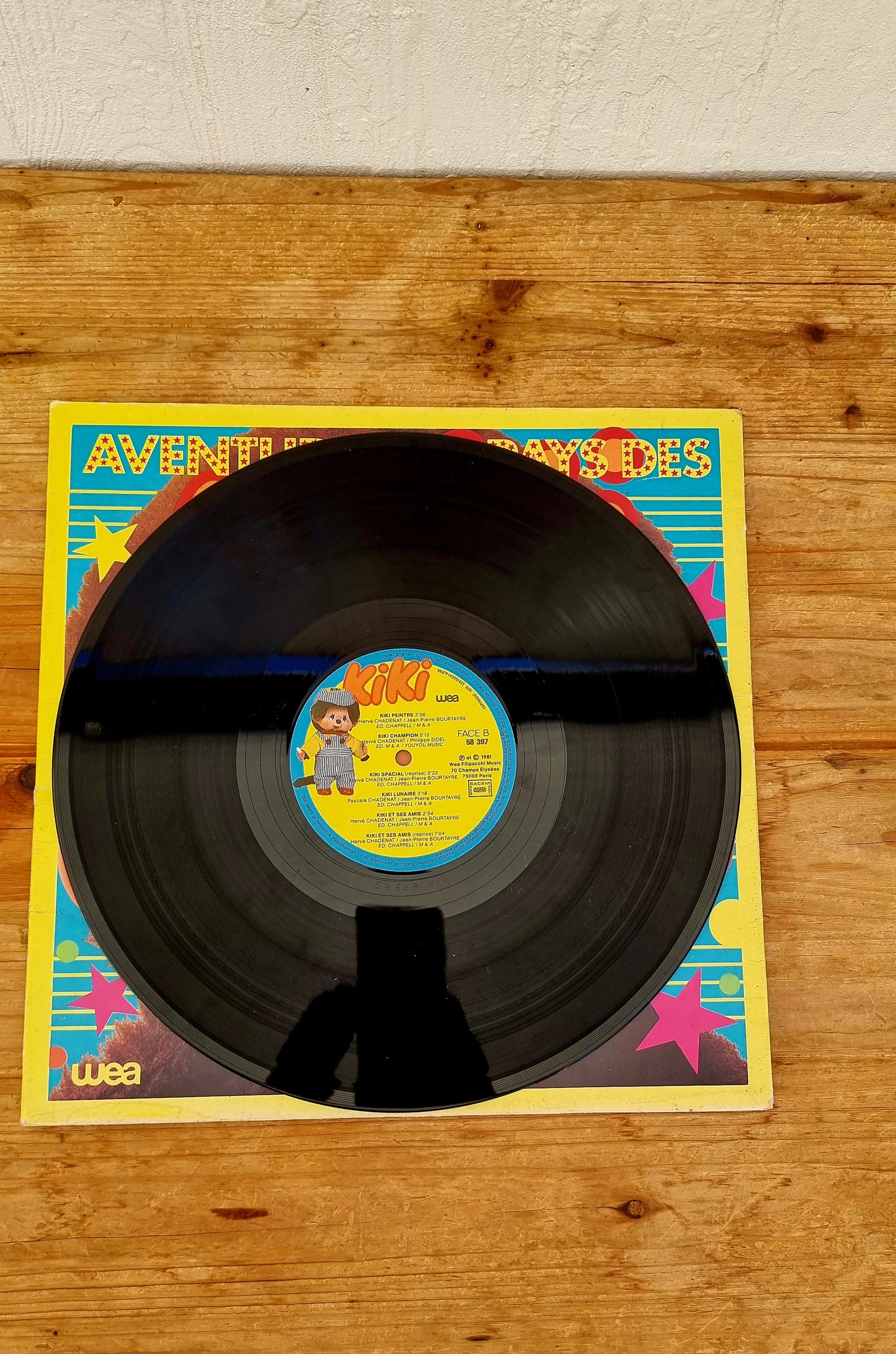 Vinyle vintage Kiki 33 tours Les Aventures au Pays des Kiki avec livret pop-up WEA